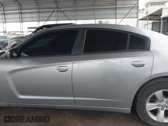 2014 Dodge Charger SE with VIN 2C3CDXBG5EH363292, listed as a IAAI auction lot 41888279 with 129,128 mi miles. Bid and sale history available at carsss.com. Image 14.