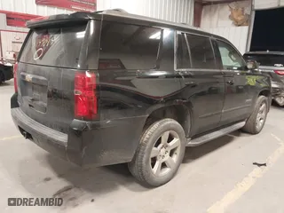 2017 Chevrolet Tahoe LS with VIN 1GNSCAKC2HR395732, listed as a IAAI auction lot 41149014 with 133,727 mi miles. Bid and sale history available at carsss.com. Image 4.