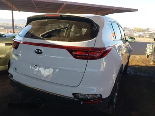 2020 Kia Sportage LX with VIN KNDPMCAC1L7689099, listed as a IAAI auction lot 41619899 with 19,523 mi miles. Bid and sale history available at carsss.com. Image 4.