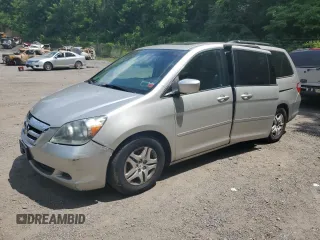 2006 Honda Odyssey EX-L with VIN 5FNRL38756B091780, listed as a Copart auction lot 63302825 with 182,999 mi miles and Clean title. Bid and sale history available at DreamBid. Image 1.