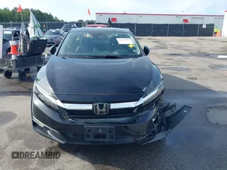 2021 Honda Clarity Touring z VIN JHMZC5F3XMC001253, wystawiony jako IAAI lot #42212102 z przebiegiem 35 649 mil mil oraz . Historia ofert i sprzedaży dostępna na DreamBid. Obrazek 12.