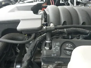 2018 Chevrolet Tahoe LT z VIN 1GNSKBKC9JR254896, wystawiony jako IAAI lot #42456940 z przebiegiem 102 459 mil mil oraz . Historia ofert i sprzedaży dostępna na DreamBid. Obrazek 19.
