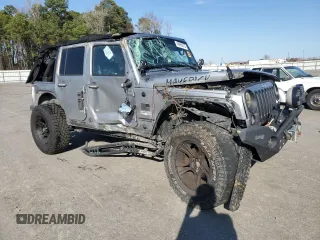 2015 Jeep Wrangler Unlimited Wrangler X with VIN 1C4BJWEG7FL580885, listed as a Copart auction lot 48891605 with 104,448 mi miles and Salvage title. Bid and sale history available at DreamBid. Image 4.