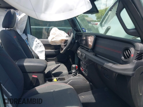 2024 Jeep Wrangler Rubicon with VIN 1C4PJXFG4RW266186, listed as a IAAI auction lot 42043265 with Not provided miles and . Bid and sale history available at DreamBid. Image 5.