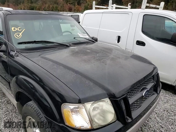 2002 Ford Explorer Sport Value z VIN 1FMYU60E92UC86847, wystawiony jako Copart lot #77086944 z przebiegiem 147 827 mil mil oraz Szkoda całkowita • Salvage title. Historia ofert i sprzedaży dostępna na DreamBid. Obrazek 11.