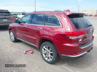 2014 Jeep Grand Cherokee Summit z VIN 1C4RJFJT4EC423217, wystawiony jako IAAI lot #42704059 z przebiegiem 245 928 mil mil oraz . Historia ofert i sprzedaży dostępna na DreamBid. Obrazek 3.