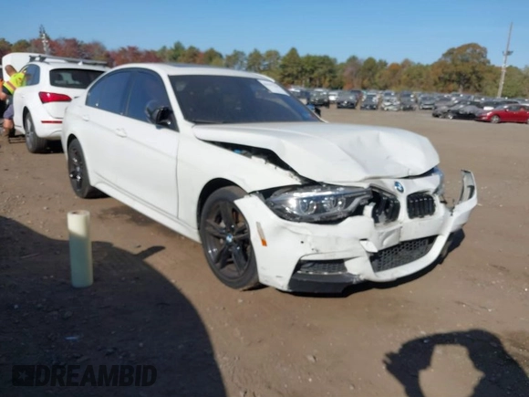 2018 BMW 3 Series 330i xDrive with VIN WBA8D9G55JNU67347, listed as a IAAI auction lot 40597140 with 68,557 mi miles. Bid and sale history available at carsss.com. Image 1.