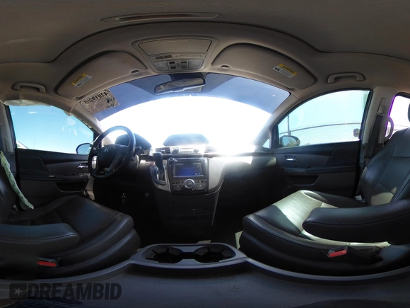 2015 Honda Odyssey Touring Elite with VIN 5FNRL5H98FB034700, listed as a IAAI auction lot 42019265 with 226,829 mi miles and . Bid and sale history available at DreamBid. Image 18.