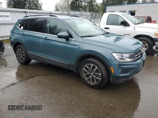 2020 Volkswagen Tiguan SE with VIN 3VV2B7AX4LM005342, listed as a Copart auction lot 52052615 with 35,787 mi miles and Salvage Title. Bid and sale history available at DreamBid. Image 4.