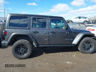 2024 Jeep Wrangler Willys z VIN 1C4RJXN61RW322456, wystawiony jako IAAI lot #41747226 z przebiegiem 2 043 mil mil oraz . Historia ofert i sprzedaży dostępna na DreamBid. Obrazek 13.