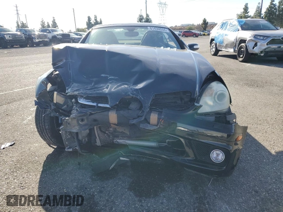 2006 Mercedes-Benz SLK-Class 5.5L AMG with VIN WDBWK73F06F082698, listed as a Copart auction lot 81430534 with 129,545 mi miles and Salvage Title. Bid and sale history available at carsss.com. Image 5.