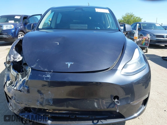 2024 Tesla Model Y z VIN 7SAYGDED4RF115252, wystawiony jako IAAI lot #42302658 z przebiegiem 7 365 mil mil oraz . Historia ofert i sprzedaży dostępna na DreamBid. Obrazek 12.