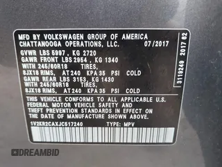 2018 Volkswagen Atlas SE z VIN 1V2KR2CAXJC517240, wystawiony jako IAAI lot #42361370 z przebiegiem 129 546 mil mil oraz . Historia ofert i sprzedaży dostępna na DreamBid. Obrazek 9.