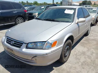 2000 Toyota Camry CE z VIN 4T1BG22K2YU924681, wystawiony jako IAAI lot #42517917 z przebiegiem 228 920 mil mil oraz . Historia ofert i sprzedaży dostępna na DreamBid. Obrazek 6.