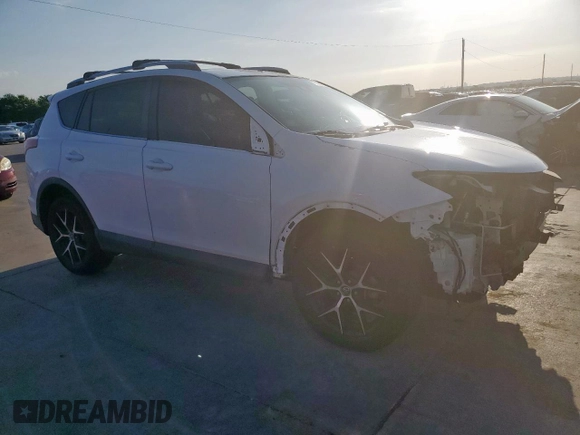 2016 Toyota RAV4 SE with VIN 2T3JFREV2GW456003, listed as a Copart auction lot 64136325 with 133,746 mi miles and Salvage title. Bid and sale history available at DreamBid. Image 4.
