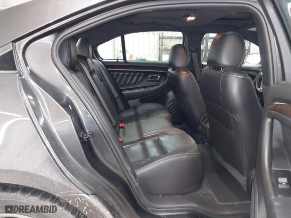 2015 Ford Taurus Limited with VIN 1FAHP2J8XFG192225, listed as a IAAI auction lot 41324244 with 100,395 mi miles. Bid and sale history available at carsss.com. Image 8.
