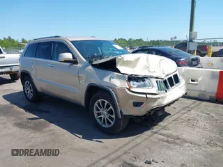 2014 Jeep Grand Cherokee Limited with VIN 1C4RJEBG4EC528934, listed as a IAAI auction lot 42033511 with 63,601 mi miles and . Bid and sale history available at DreamBid. Image 1.