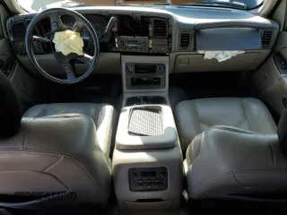 2004 Chevrolet Tahoe LS with VIN 1GNEC13TX4R203771, listed as a Copart auction lot 51156225 with 119,332 mi miles and Salvage Title. Bid and sale history available at carsss.com. Image 8.