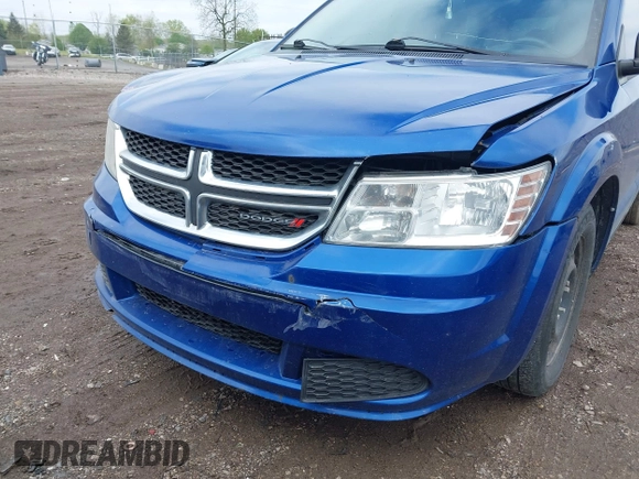 2015 Dodge Journey SE z VIN 3C4PDCAB8FT552555, wystawiony jako IAAI lot #42195398 z przebiegiem 149 503 mil mil oraz . Historia ofert i sprzedaży dostępna na DreamBid. Obrazek 6.