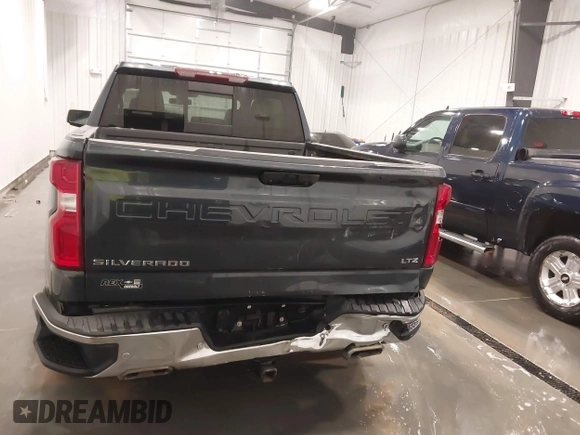 2022 Chevrolet Silverado 1500 LTZ with VIN 1GCUYGEL4NZ187865, listed as a IAAI auction lot 41422797 with 98,524 mi miles and . Bid and sale history available at DreamBid. Image 17.