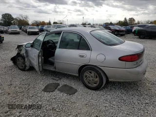 1998 Ford Escort SE with VIN 1FAFP13P6WW182609, listed as a Copart auction lot 77876884 with 165,162 mi miles and Salvage Title. Bid and sale history available at carsss.com. Image 2.