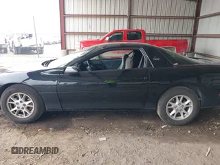 2002 Chevrolet Camaro z VIN 2G1FP22K822119358, wystawiony jako IAAI lot #42530943 z przebiegiem 98 277 mil mil oraz . Historia ofert i sprzedaży dostępna na DreamBid. Obrazek 14.