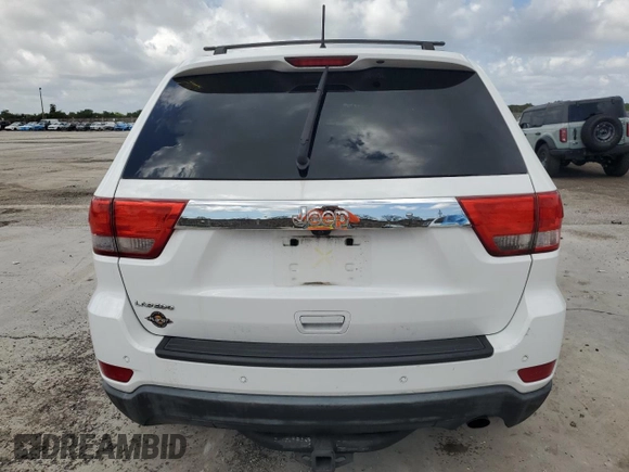 2013 Jeep Grand Cherokee Laredo with VIN 1C4RJEAG4DC517044, listed as a Copart auction lot 51250875 with 150,388 mi miles and Salvage Title. Bid and sale history available at carsss.com. Image 6.