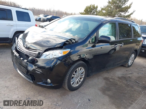 2015 Toyota Sienna XLE with VIN 5TDYK3DC2FS651400, listed as a IAAI auction lot 41985468 with 122,335 mi miles and . Bid and sale history available at DreamBid. Image 2.