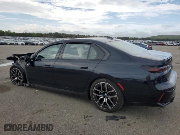 2024 BMW 7 Series 740i xDrive with VIN WBA33EH09RCR24113, listed as a Copart auction lot 56699365 with Not provided miles and Salvage title. Bid and sale history available at DreamBid. Image 2.