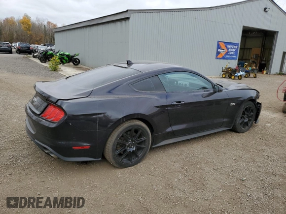 2022 Ford Mustang GT с VIN 1FA6P8CF0N5118652, выставлен на аукционе Copart как лот 75289414 с пробегом 38 077 миль миль и Списание • Salvage title. История ставок и продаж доступна на DreamBid. Изображение 3.