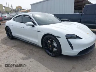 2022 Porsche Taycan z VIN WP0AA2Y12NSA13356, wystawiony jako IAAI lot #42083009 z przebiegiem Nie podano mil oraz . Historia ofert i sprzedaży dostępna na DreamBid. Obrazek 1.