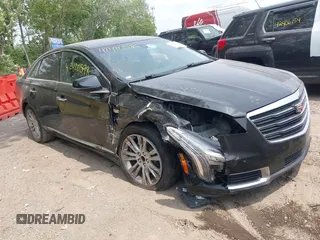 2019 Cadillac XTS Luxury with VIN 2G61M5S32K9119256, listed as a IAAI auction lot 42420598 with 146,735 mi miles and . Bid and sale history available at DreamBid. Image 1.