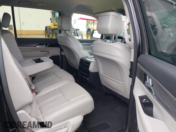 2023 Jeep Wagoneer Series II with VIN 1C4SJRBP4PS562826, listed as a IAAI auction lot 42600245 with 62,557 mi miles and . Bid and sale history available at DreamBid. Image 8.