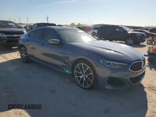 2022 BMW 8 Series M850i z VIN WBAGV8C08NCK07510, wystawiony jako Copart lot #84925344 z przebiegiem 16 955 mil mil oraz Szkody całkowita. Historia ofert i sprzedaży dostępna na DreamBid. Obrazek 4.