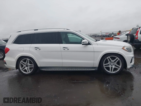 2014 Mercedes-Benz GL-Class GL 550 with VIN 4JGDF7DEXEA328392, listed as a IAAI auction lot 41187269 with 1 mi miles. Bid and sale history available at carsss.com. Image 13.