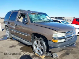 2004 Chevrolet Tahoe LT with VIN 1GNEC13ZX4R235169, listed as a IAAI auction lot 40823137 with 204,957 mi miles. Bid and sale history available at carsss.com. Image 1.