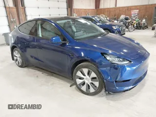 2023 Tesla Model Y Long Range z VIN 7SAYGDEE0PA124551, wystawiony jako IAAI lot #42331624 z przebiegiem 27 828 mil mil oraz . Historia ofert i sprzedaży dostępna na DreamBid. Obrazek 1.