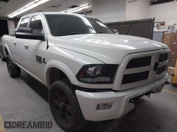 2017 Ram 2500 Laramie with VIN 3C6UR5FL1HG726325, listed as a IAAI auction lot 42315570 with 104,038 mi miles and . Bid and sale history available at DreamBid. Image 1.