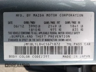 2012 Mazda Mazda3 i Touring with VIN JM1BL1L84C1671872, listed as a IAAI auction lot 42116842 with 85,343 mi miles. Bid and sale history available at carsss.com. Image 9.