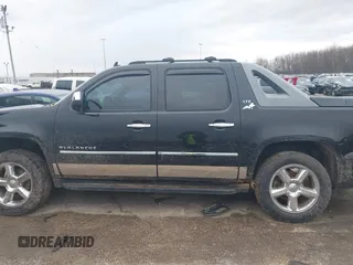 2011 Chevrolet Avalanche LTZ with VIN 3GNTKGE33BG111277, listed as a IAAI auction lot 42123375 with 209,024 mi miles. Bid and sale history available at carsss.com. Image 14.