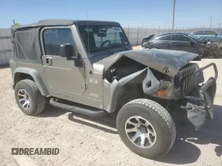 2004 Jeep Wrangler X with VIN 1J4FA39S44P785613, listed as a Copart auction lot 48664455 with 135,684 mi miles and Salvage Title. Bid and sale history available at carsss.com. Image 4.