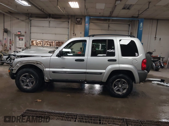 2004 Jeep Liberty Sport with VIN 1J4GL48K44W182897, listed as a IAAI auction lot 40768956 with 241,550 mi miles and . Bid and sale history available at DreamBid. Image 15.