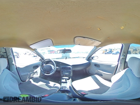 2001 Saturn SL with VIN 1G8ZK52731Z237050, listed as a Copart auction lot 60977394 with Not provided miles and Salvage title. Bid and sale history available at DreamBid. Image 12.