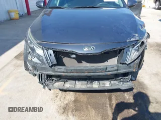 2015 Kia Optima LX with VIN 5XXGM4A77FG381505, listed as a IAAI auction lot 42105568 with 164,641 mi miles and . Bid and sale history available at DreamBid. Image 6.