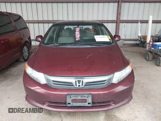 2012 Honda Civic LX z VIN 2HGFB2F50CH596442, wystawiony jako IAAI lot #42160402 z przebiegiem 130 152 mil mil oraz . Historia ofert i sprzedaży dostępna na DreamBid. Obrazek 12.