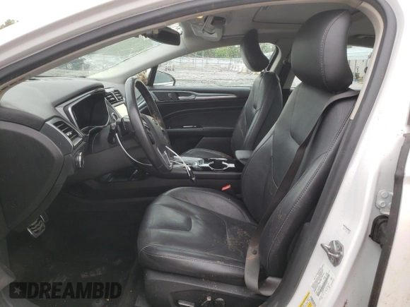 2016 Ford Fusion Titanium with VIN 3FA6P0K90GR110354, listed as a Copart auction lot 58849025 with 148,662 mi miles and Salvage title. Bid and sale history available at DreamBid. Image 7.
