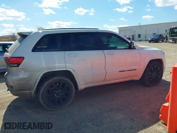 2017 Jeep Grand Cherokee Laredo with VIN 1C4RJFAG9HC824883, listed as a IAAI auction lot 41876117 with 141,067 mi miles. Bid and sale history available at carsss.com. Image 13.