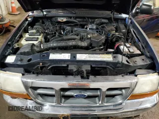 2000 Ford Ranger XL with VIN 1FTZR15V8YTA83226, listed as a Copart auction lot 51004555 with 218,083 mi miles and Salvage title. Bid and sale history available at DreamBid. Image 12.