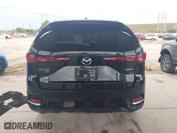 2025 Mazda CX-70 Premium Plus with VIN JM3KJEHA2S1111590, listed as a IAAI auction lot 41650609 with 5,377 mi miles and . Bid and sale history available at DreamBid. Image 16.