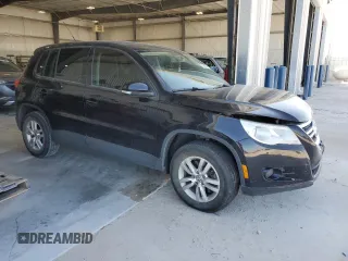 2011 Volkswagen Tiguan SE with VIN WVGBV7AX3BW520381, listed as a Copart auction lot 52288555 with 170,460 mi miles and Salvage Title. Bid and sale history available at DreamBid. Image 4.